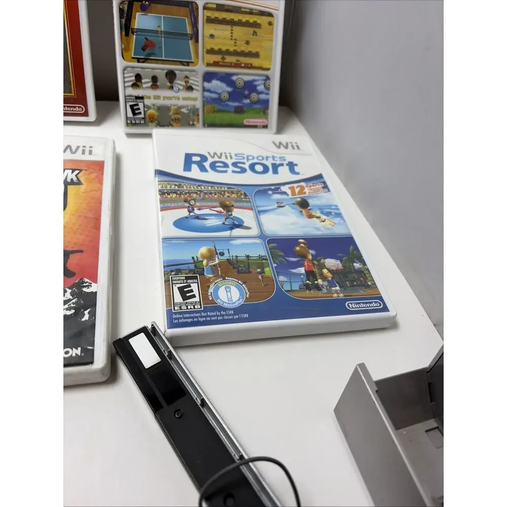 Nintendo Wii 25th Anniversary Red Console Bundle, 3 Remotes, 4 Games ,2 Nunchuk